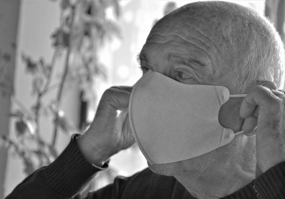 Older adult with Covid mask