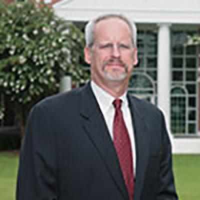 Dr. Wayne Logan